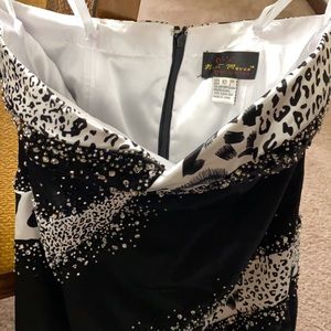 Formal gown with small train.